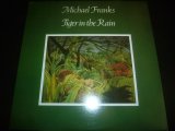 MICHAEL FRANKS/TIGER IN THE RAIN